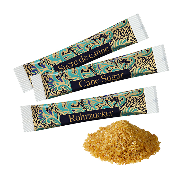 Brauner Zucker im Papierstäbchen Brauner Zucker im Papierstäbchen